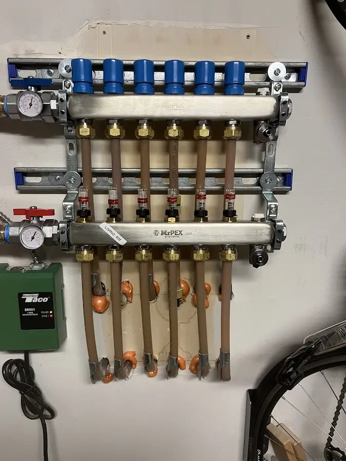 Plumber performing Gas Leak Detection at a residential property in Tanglewilde